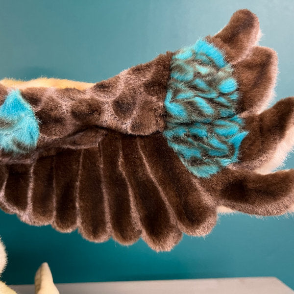 close up of wing of plush kookaburra puppet