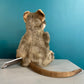 rear view of plush quokka puppet showing tail and back of ears