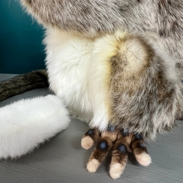 close up of detail of possum puppet paw showing air brushed detailed markings