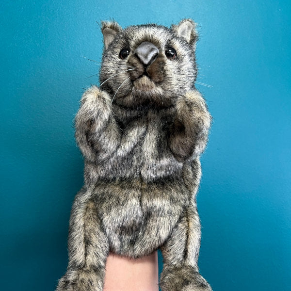 wombat puppet in dark brown with black accents on fur