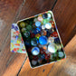 Tin of Marbles