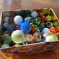 Tin of Marbles